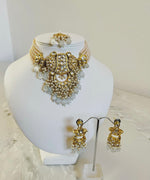 Royal necklace,earring and tikka set